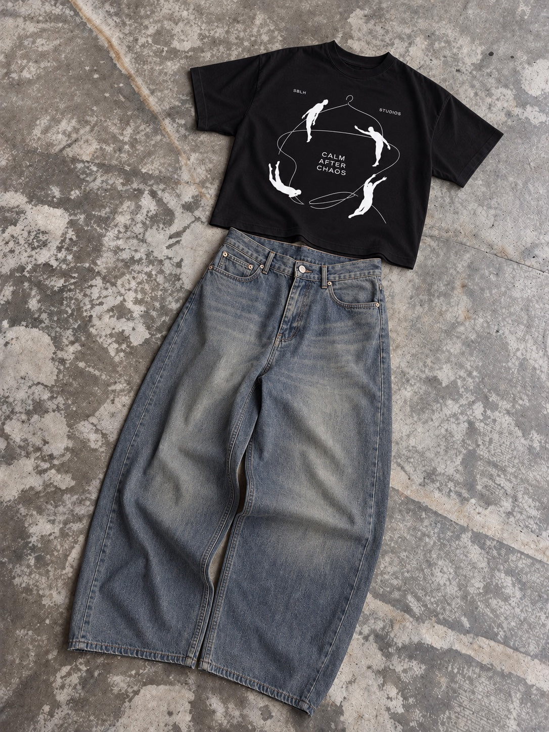 Calm After Chaos black boxy tee with Dust-Line baggy balloon jeans set